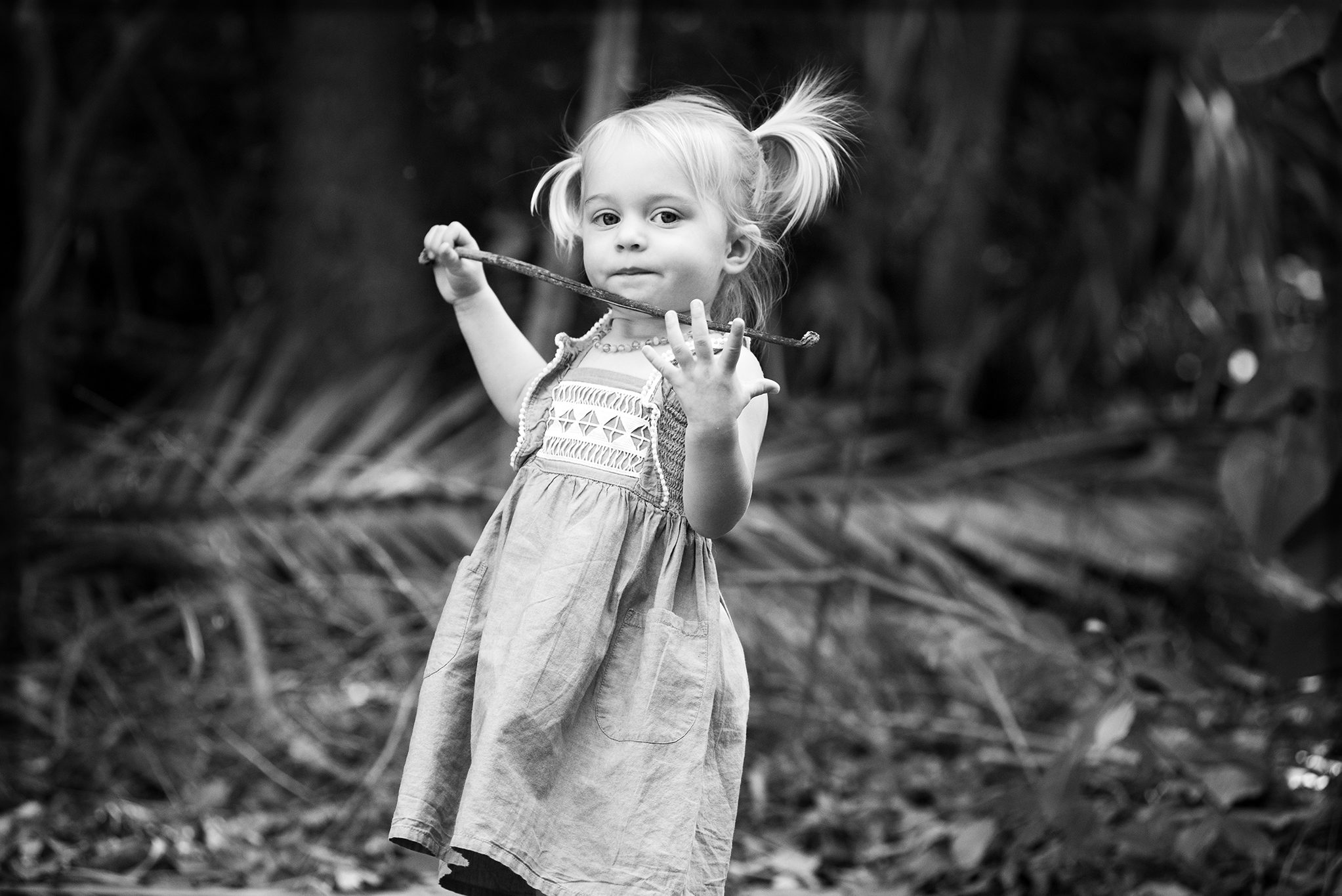 Girl playing in the bush